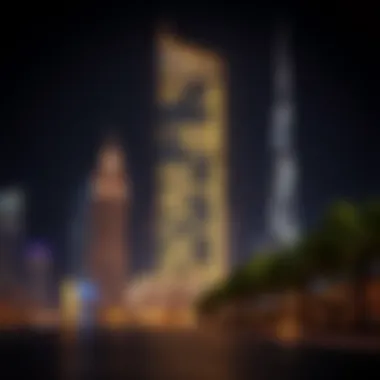 Night view of Al Wasl Building illuminated against the Dubai skyline