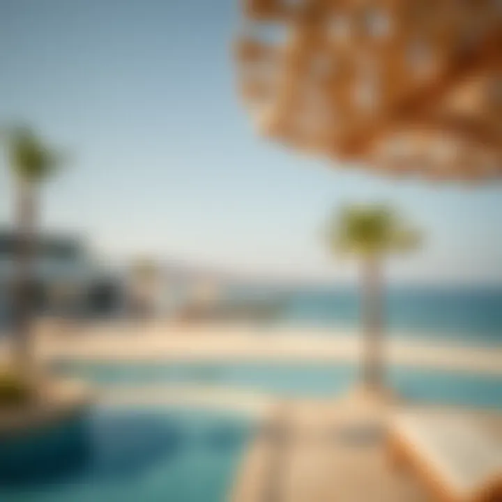 Scenic beach view at Al Hamra Village highlighting relaxation spots
