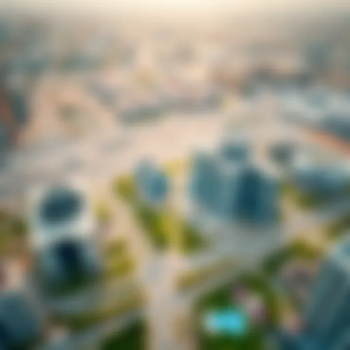 Aerial view of JLT Cluster E showcasing its modern skyline and green spaces