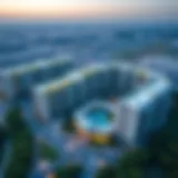 Aerial view of NMC Quasais showcasing modern architecture and greenery