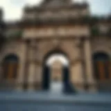 A historic city gate adorned with intricate stone carvings